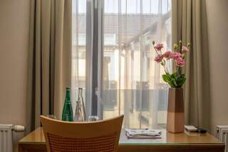 Отель Euterpe Hotel Клайпеда Стандартный двухместный номер с 1 кроватью или 2 отдельными кроватями-5